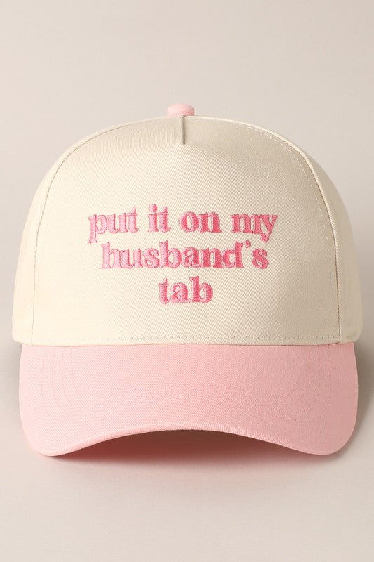 Put It On My Husband's Tab Embroidered Trucker Hat (pink)